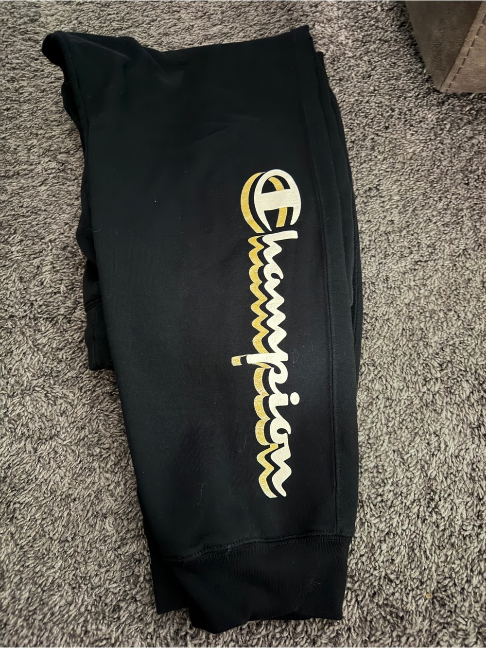 Champion women’s Black Joggers with Yellow Logo Script